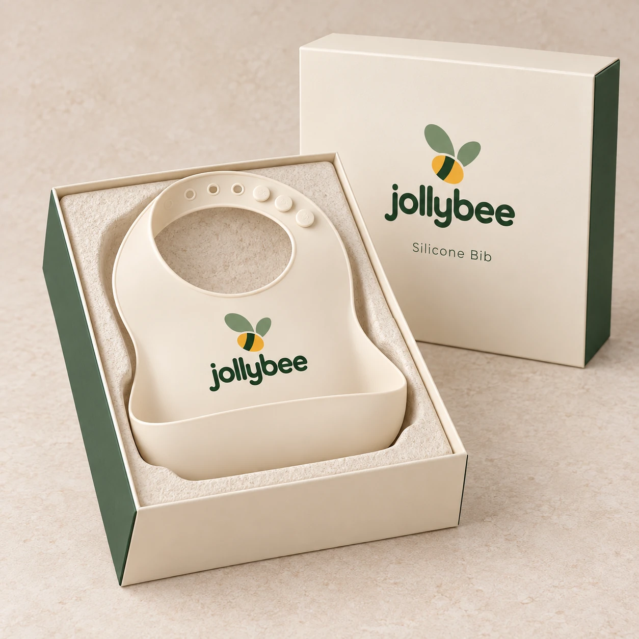 Jollybee silicone catch bib placed inside its visible open branded box