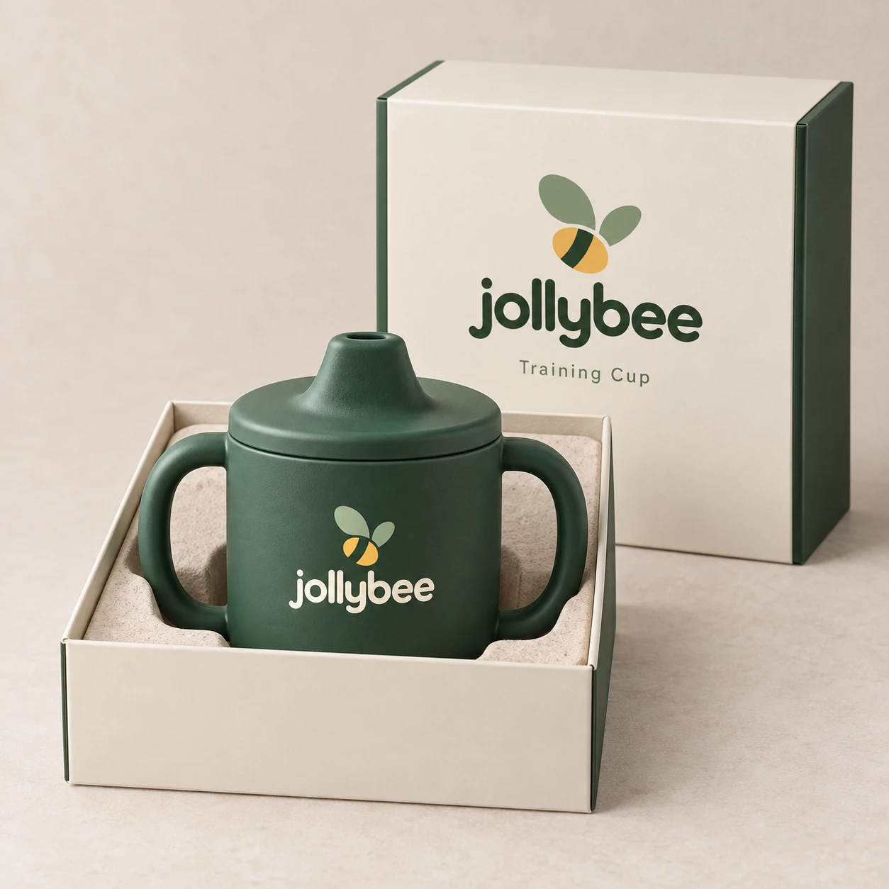 Jollybee two-handle training cup placed inside its visible open branded box